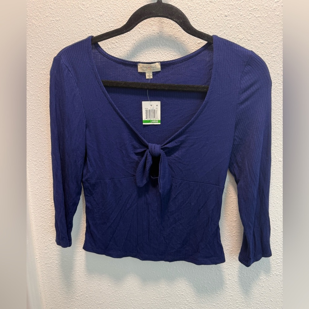 Ultra Flirt navy blue ribbed featuring a tie front design and cutout 3/4 sleeves